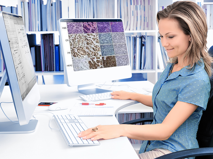Pathologist uses the PathoZoom Diagnostic Assistant at her home office desk